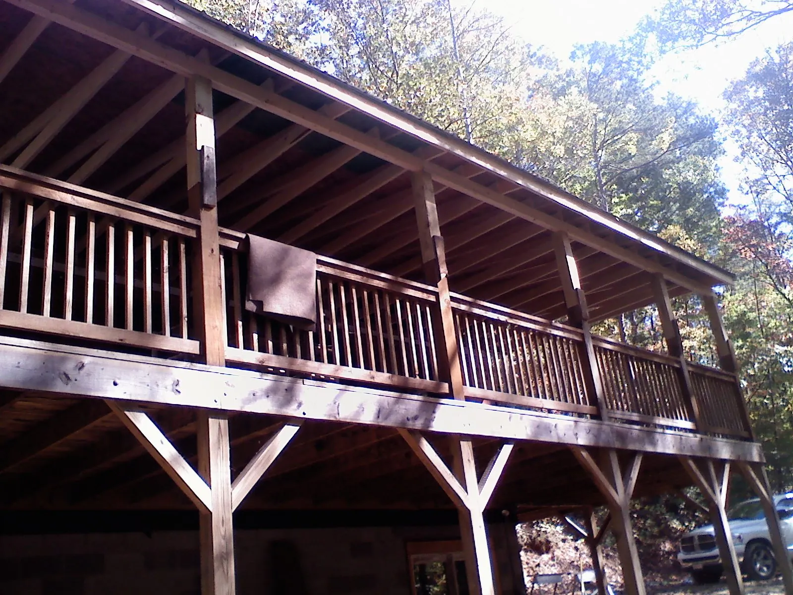 Timber framing under a new elevated porch and deck — Roof Leak Repair in Dahlonega by Roofing Brothers